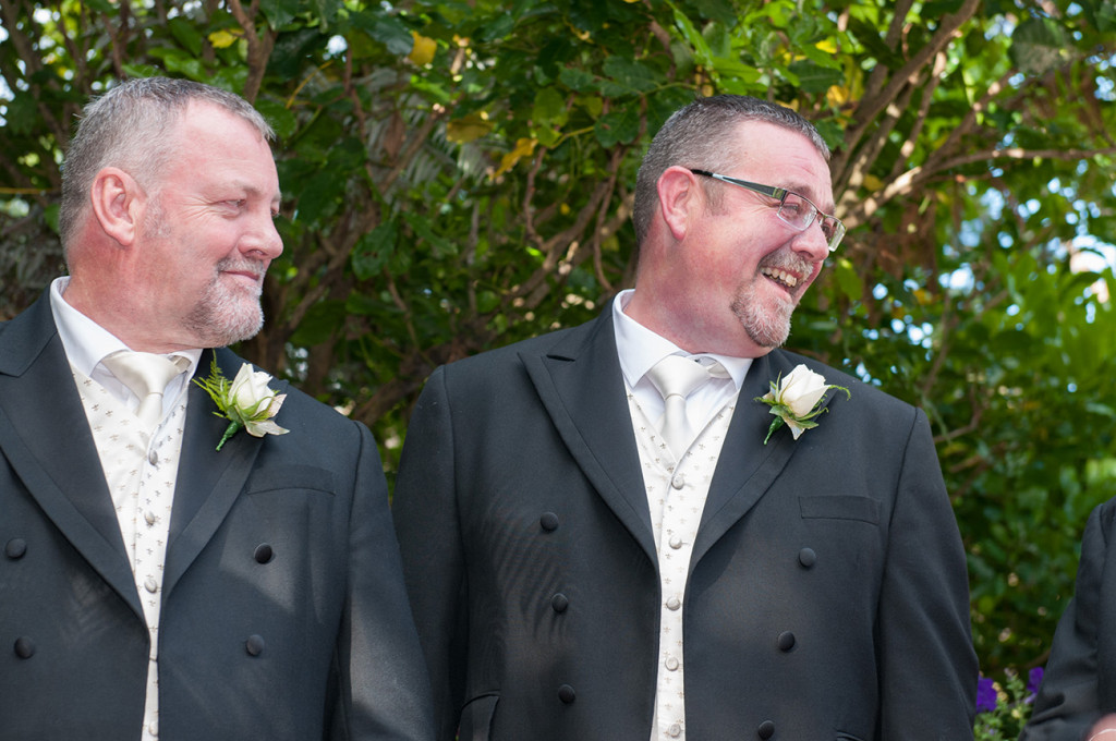 A groom laughs at a comment Homosexual Wedding Auckland Photographer Anais Chaine