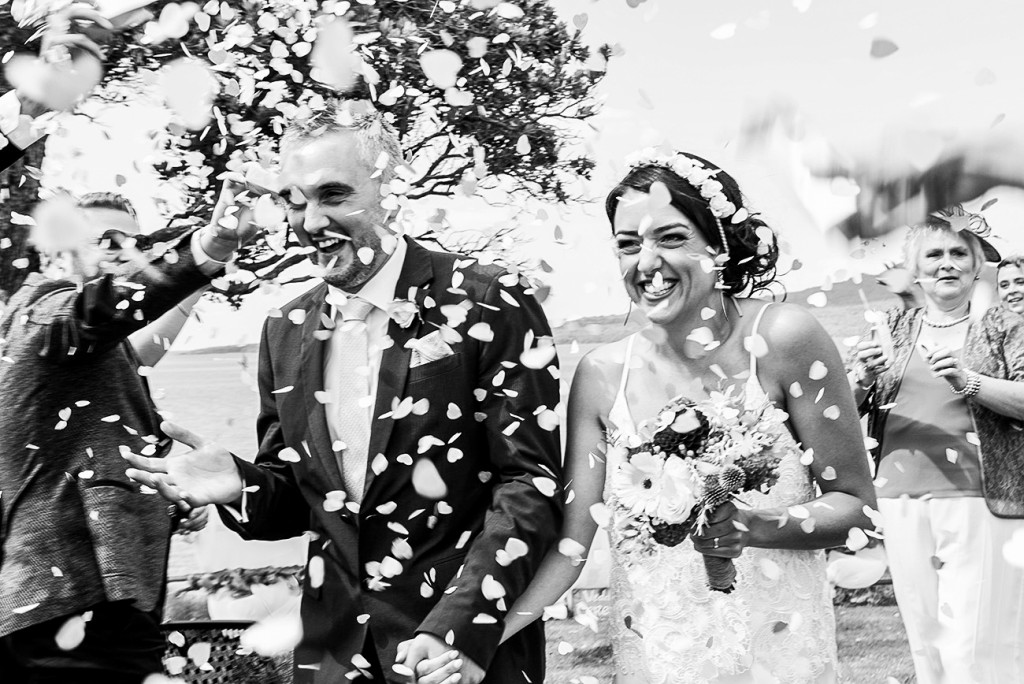 black and white the guests throwing confetti