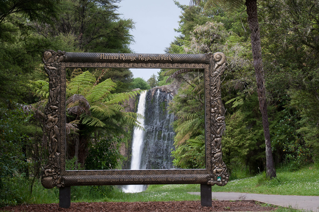 Hunua Falls Regional Park with big maori frame with the falls behind
