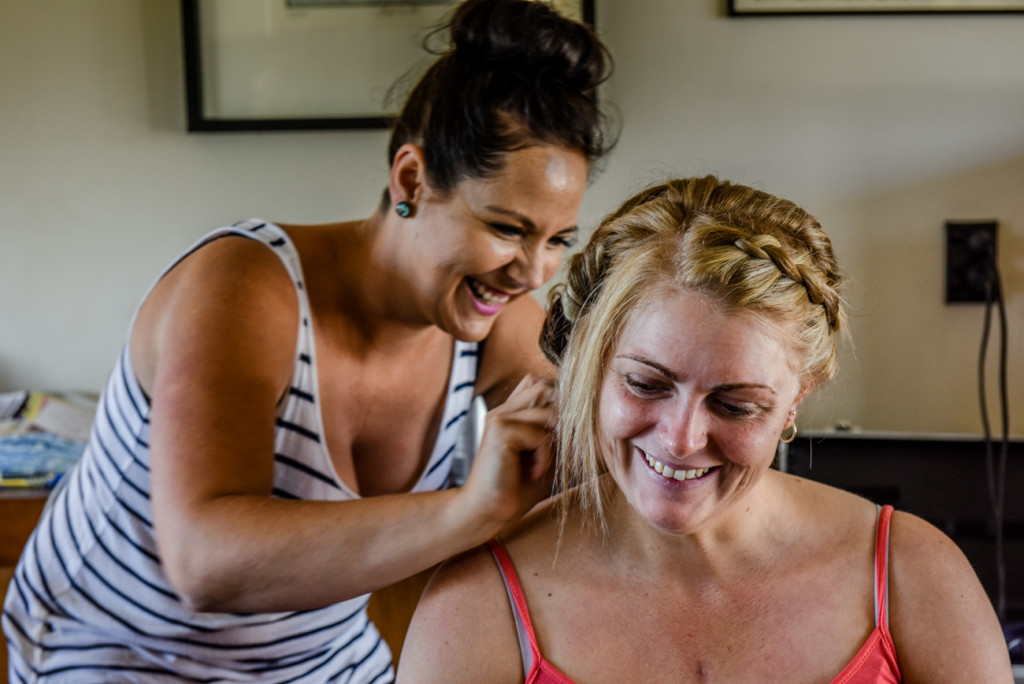 Family hairdresser Kimberley Pedrseen doing up one of the bridesmaid's hair