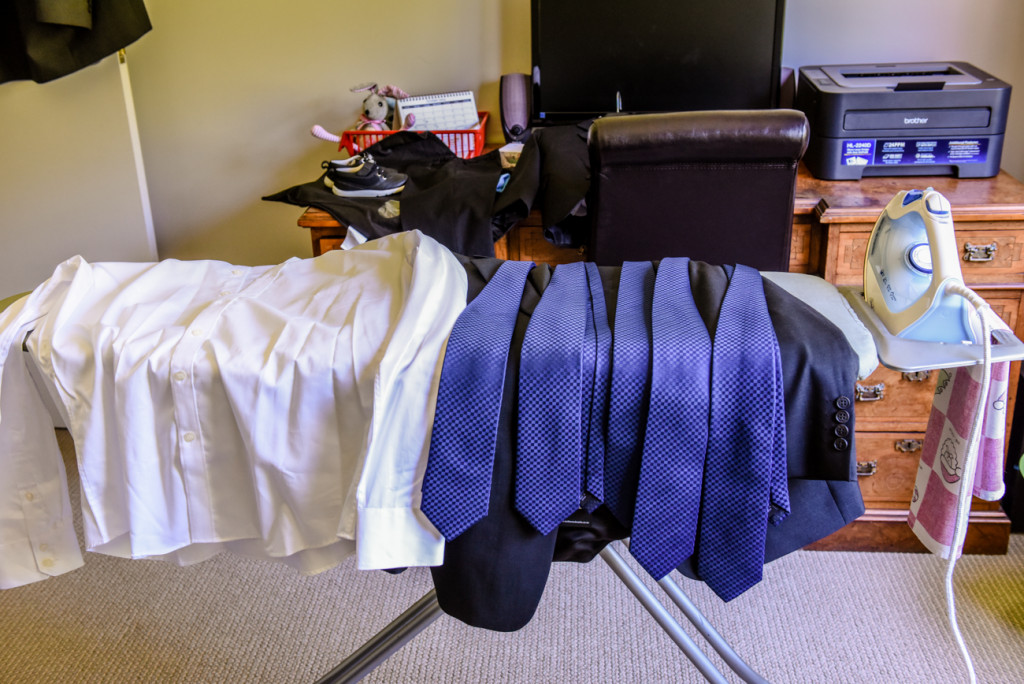 The groom's blue ties ironed and ready for wearing