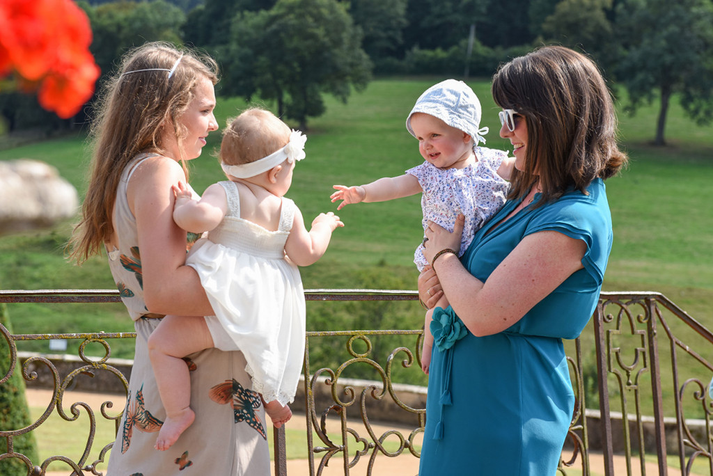 Babies playing with each other at a French Wedding in Pranemoux Castle France captured by French photographer