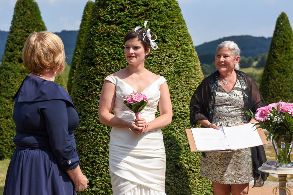 Bride and her mother at the altar at their Outdoor French Wedding in Pranemoux Castle France