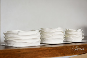 Three parts of a wedding cake to be assembled. © Anais Photography.