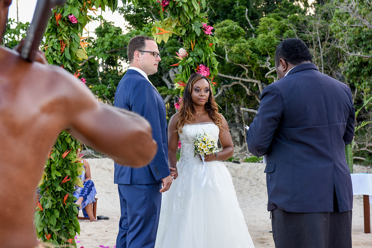 The local pastor is marrying the bride and the groom At Paradise Cove Island resort in the Yasawas, Fiji