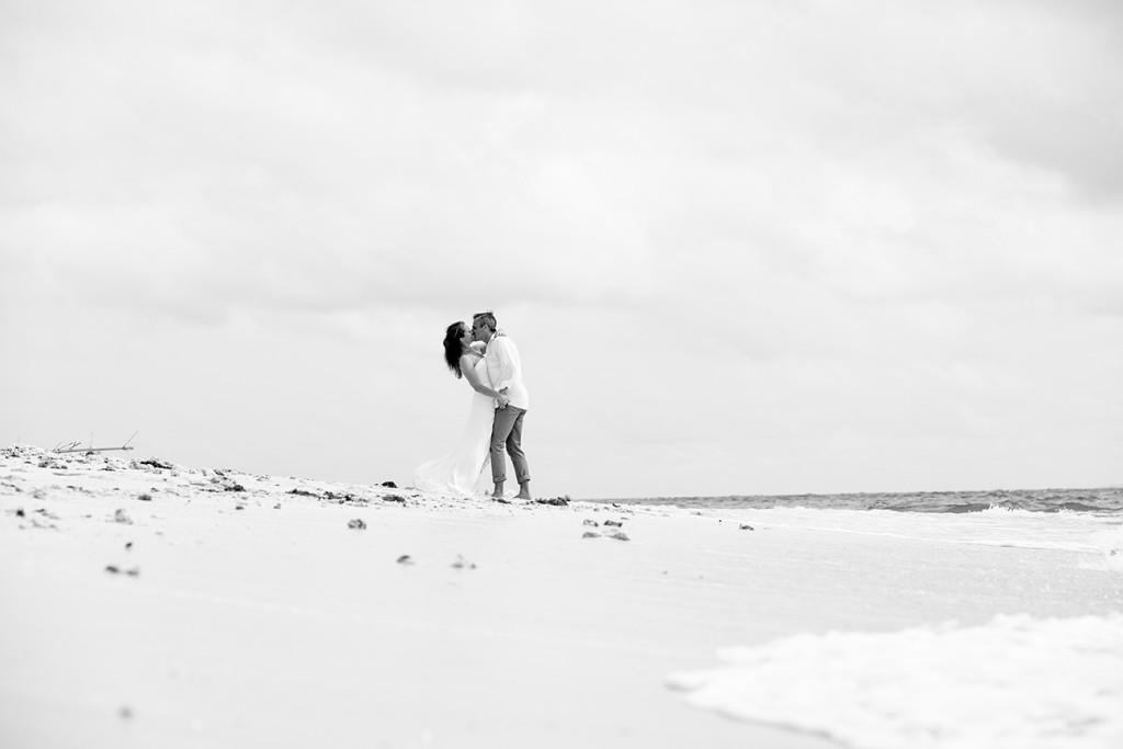 Couple kissing at Vomo island resort Fiji