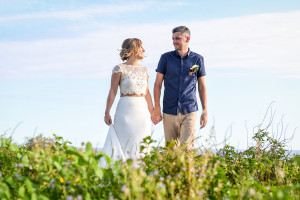 Happily eloped couple in Fiji landscape