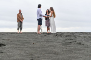 Elopement wedding ceremony on Karekare Beach Auckland New Zealand