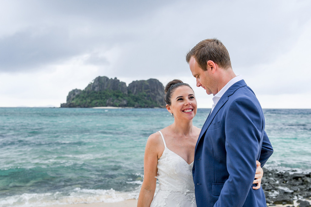Happy couple on beach at Vomo Island Resort Fiji