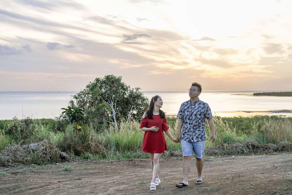 Young couple walking against the sunset in Denarau Coral Coast Nadi Fiji