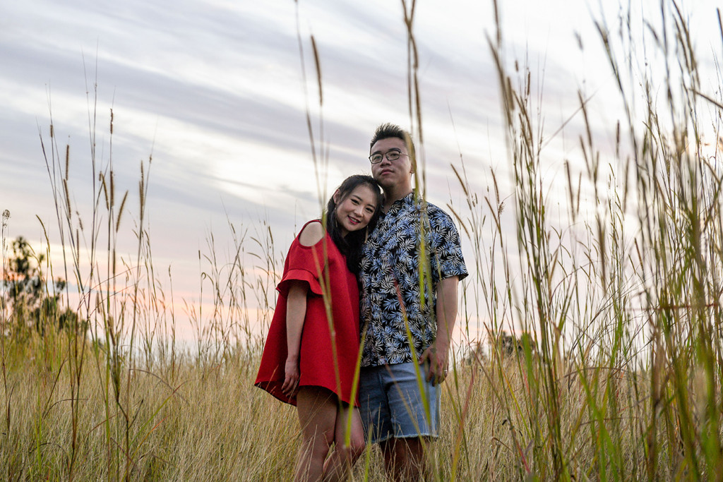 Young asian couple pose in country engagement photoshoot Nada Fiji