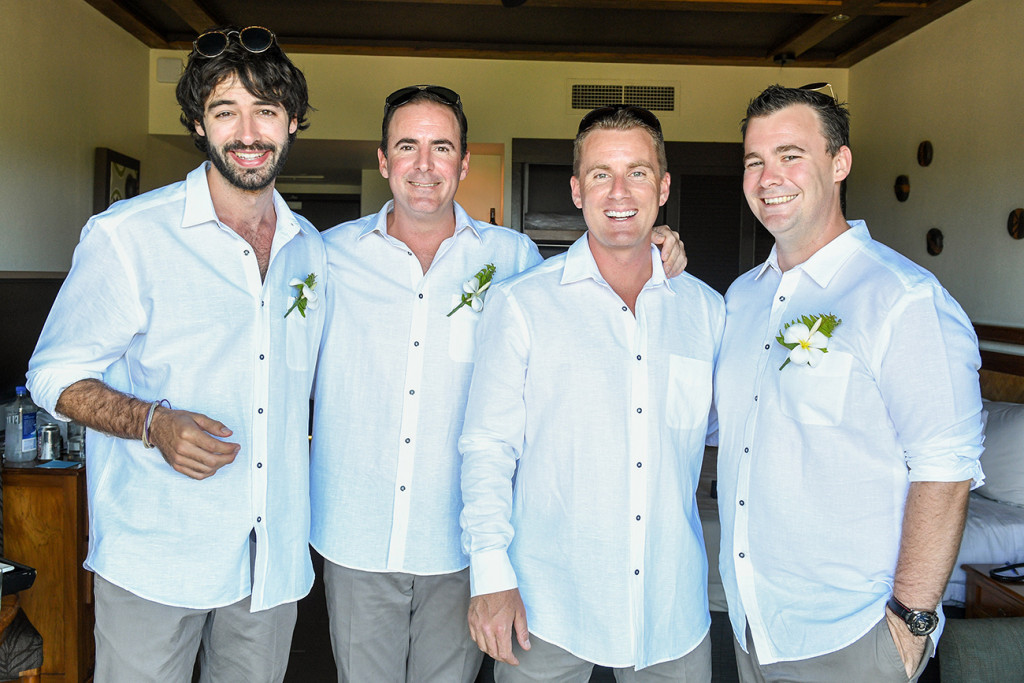 Groom and groomsmen pose during prep in Outrigger Fiji