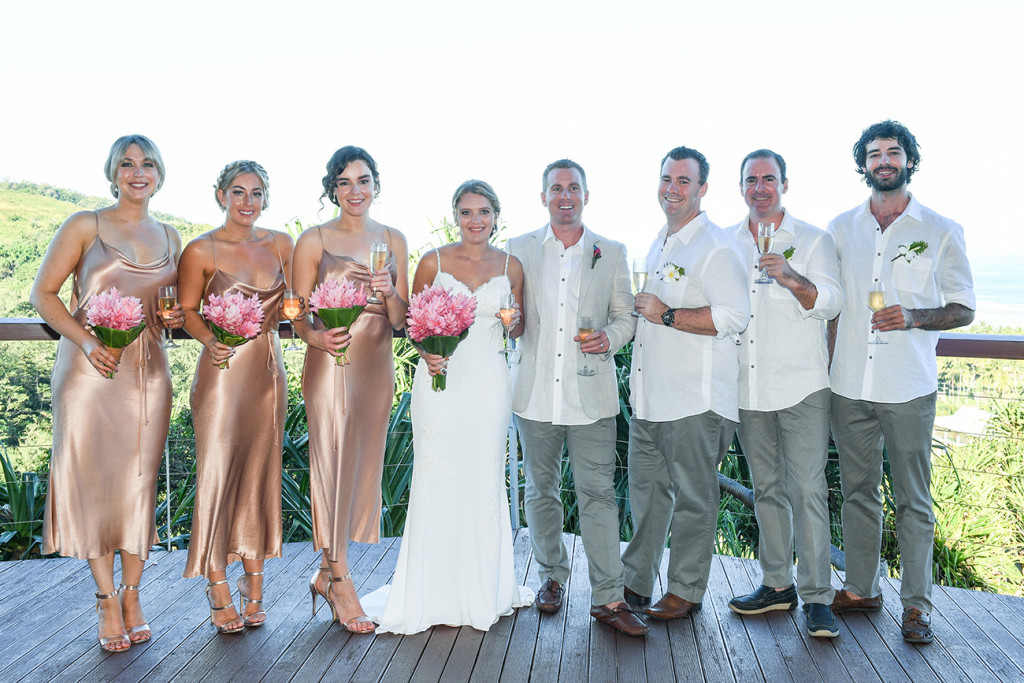 Bridal party toast with champagne at the Outrigger wedding Fiji