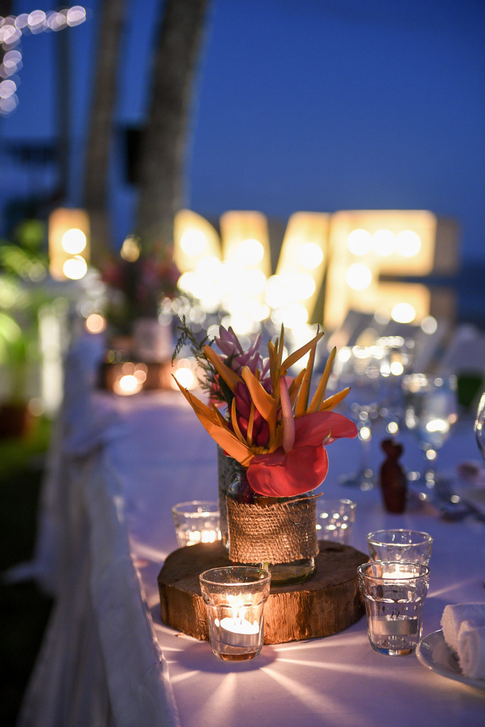Stunning reception setup with tropical flowers at the Outrigger Fiji