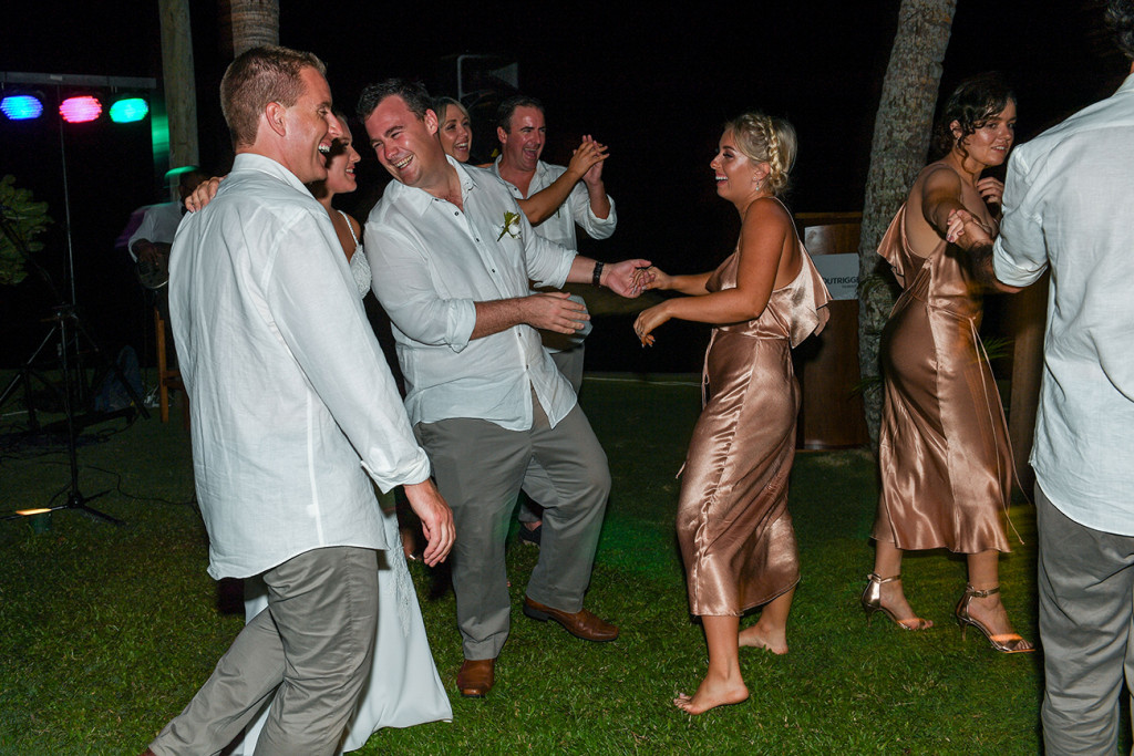 Bridal party dance at the Outrigger beach wedding