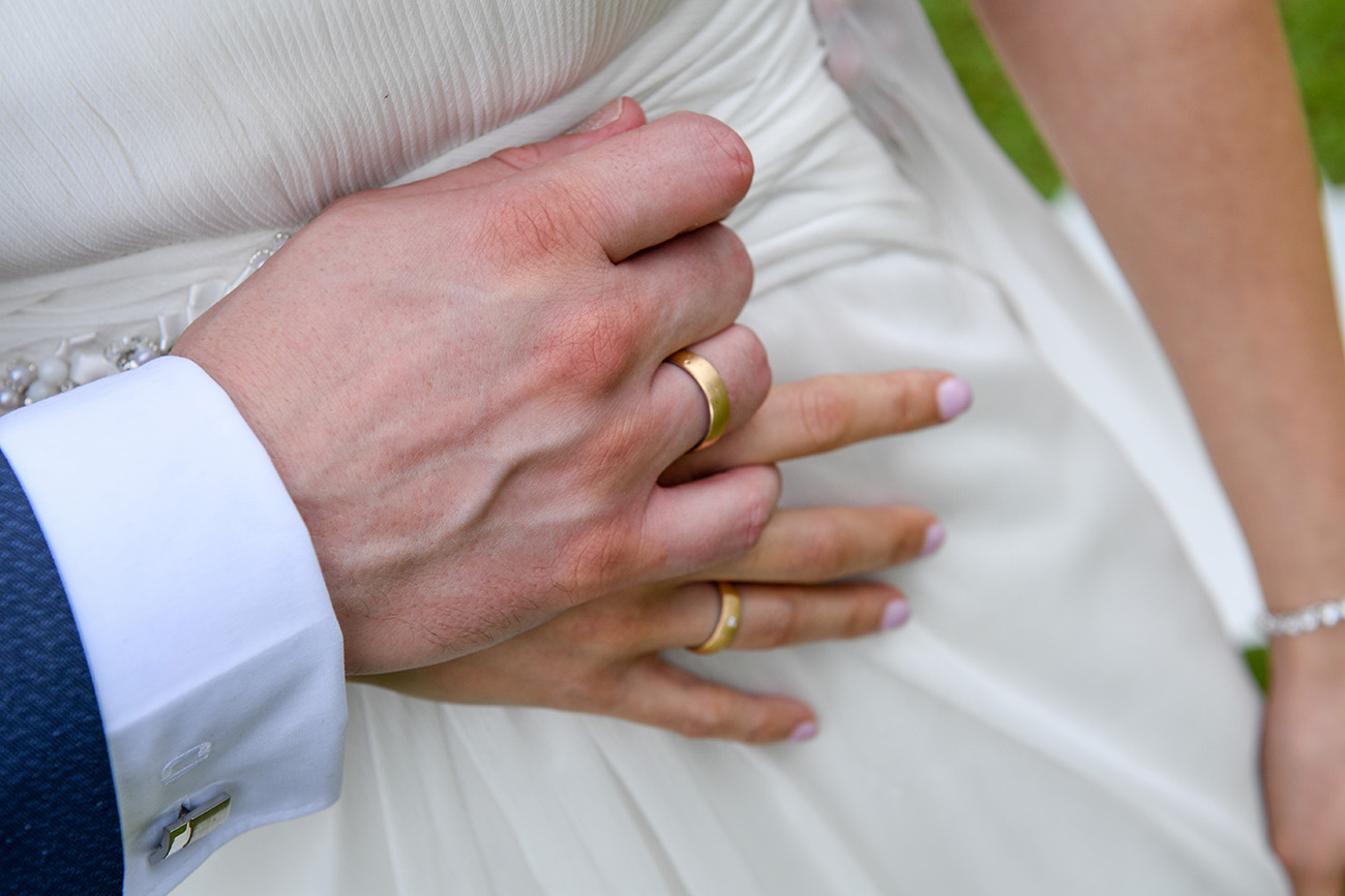 Closeup of bride and groom rings