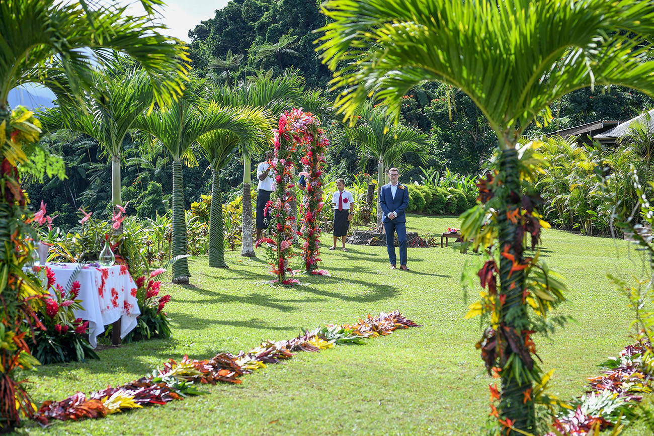 Groom waits for his bride at the altar in Fiji countryside