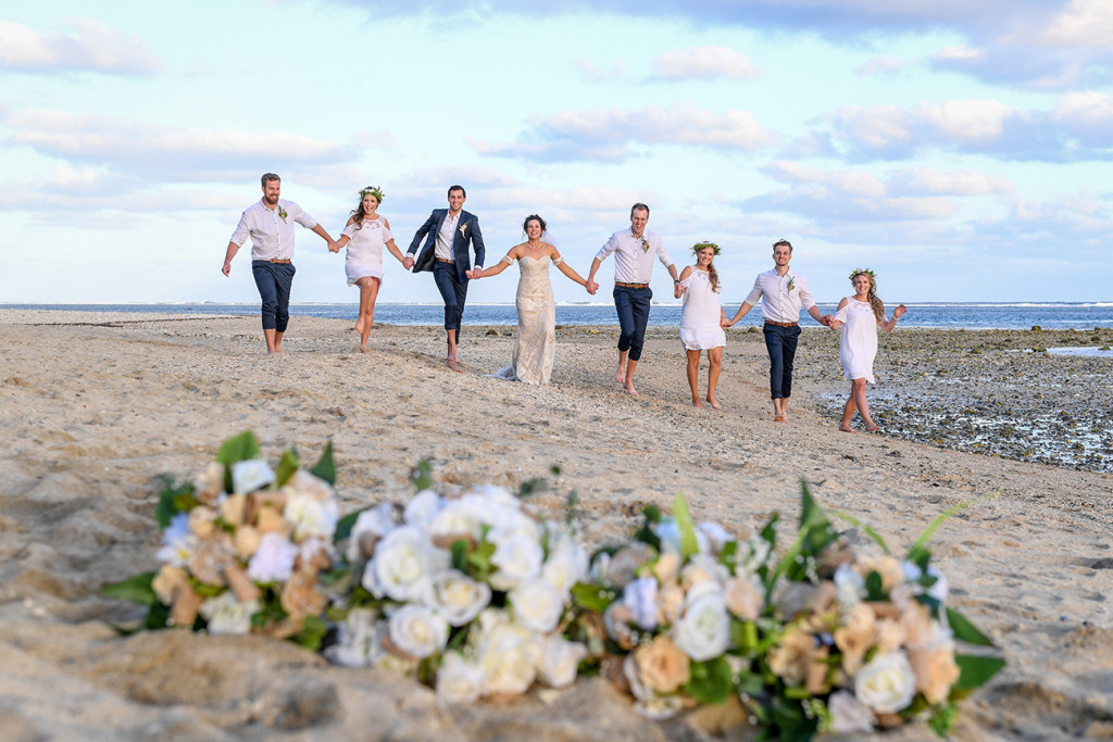 Bridal party walk down the hill at Outrigger Fiji wedding