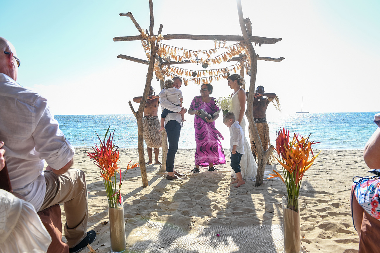 Couple marrying at the Altar by the ocean