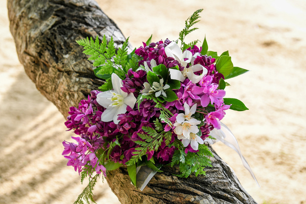Wedding bouquet purple and white flowers , Matangi island resort in Fiji