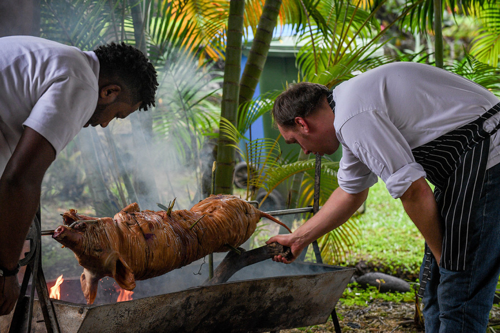 Traditional Wedding Roast pig on a spit by Taste Fiji
