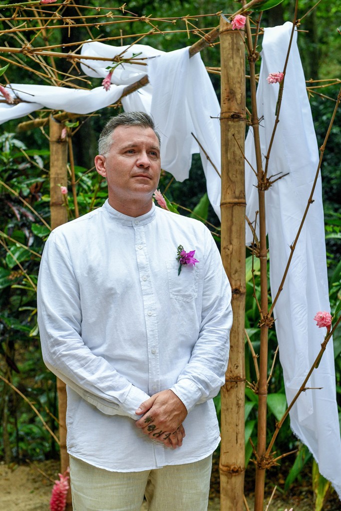 The groom eagerly waits for his bride