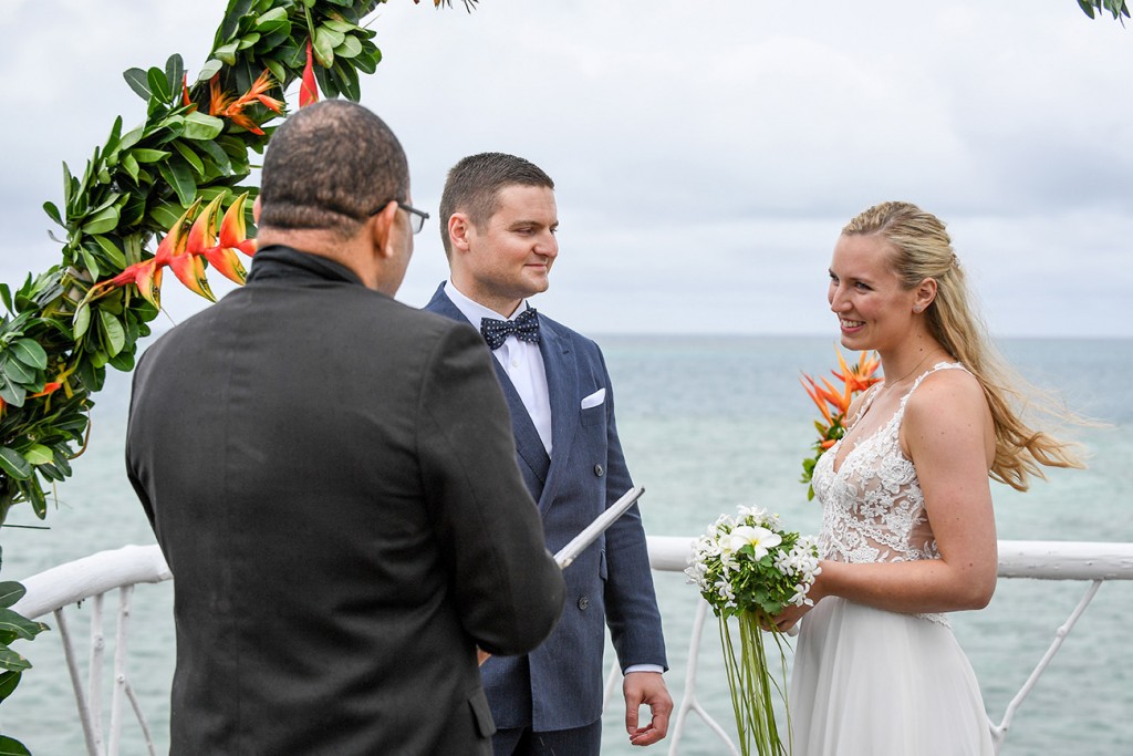 The couple shares their vows overlooking views of the Pacific ocean