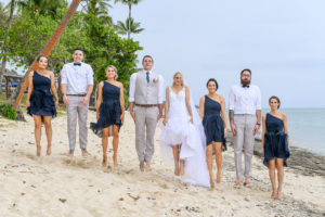 The bridal party jump in unison at the Shangri La Fiji