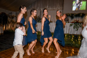 The bridesmaids dance at the wedding reception