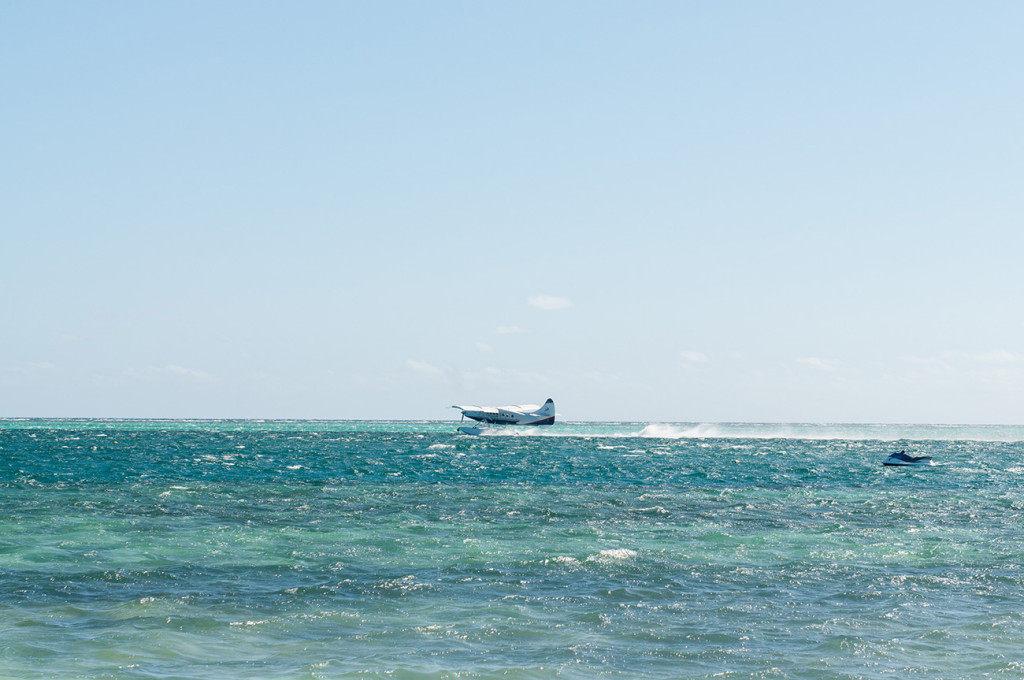 Seaplane landing at Mana Island resort, Fiji by Anais Photography
