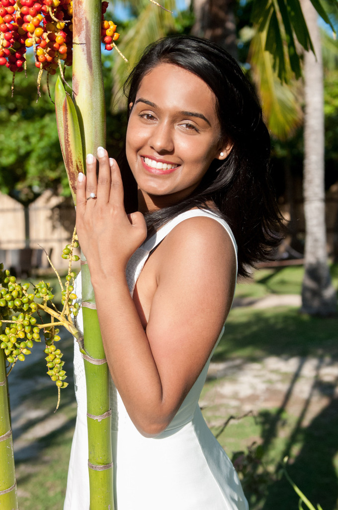 Portrait of the newly fiancee with her diamond engagement wedding ring at Mana Island resort, Fiji by Anais Photography
