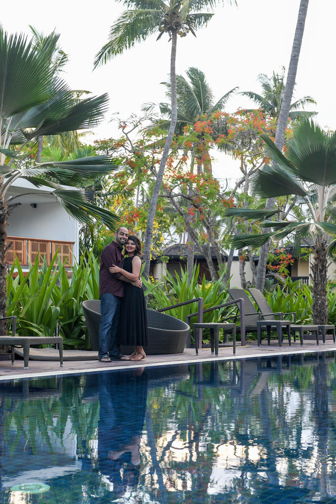 Couple posing by the Westin swimming pool at the Spa, Fiji