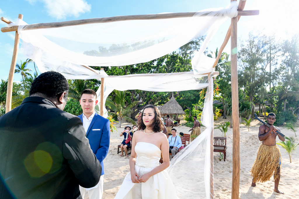 The celebrant is giving the wedding ceremony at Paradise cove island resort, Yasawas, Fiji
