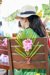 The chairs have fresh tropical flower for decoration at the wedding ceremony at Paradise cove island resort, Yasawas, Fiji