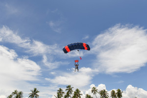 The bride and groom are parasailing by the sheraton beach in Denerau, Fiji