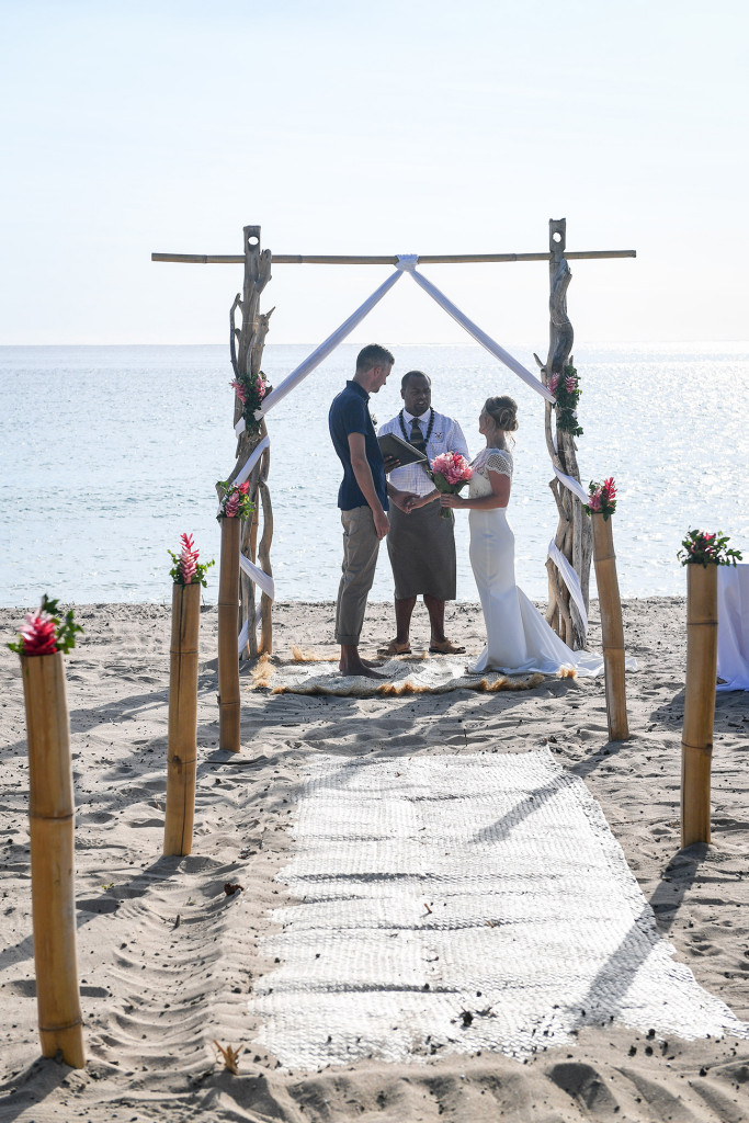 Bride and groom at the altar in Yatule Fiji elopement