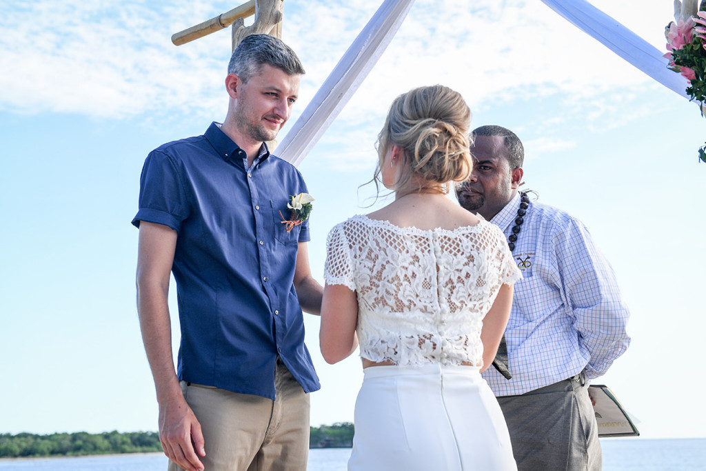 Vow exchange in Fiji elopement beach wedding ceremony