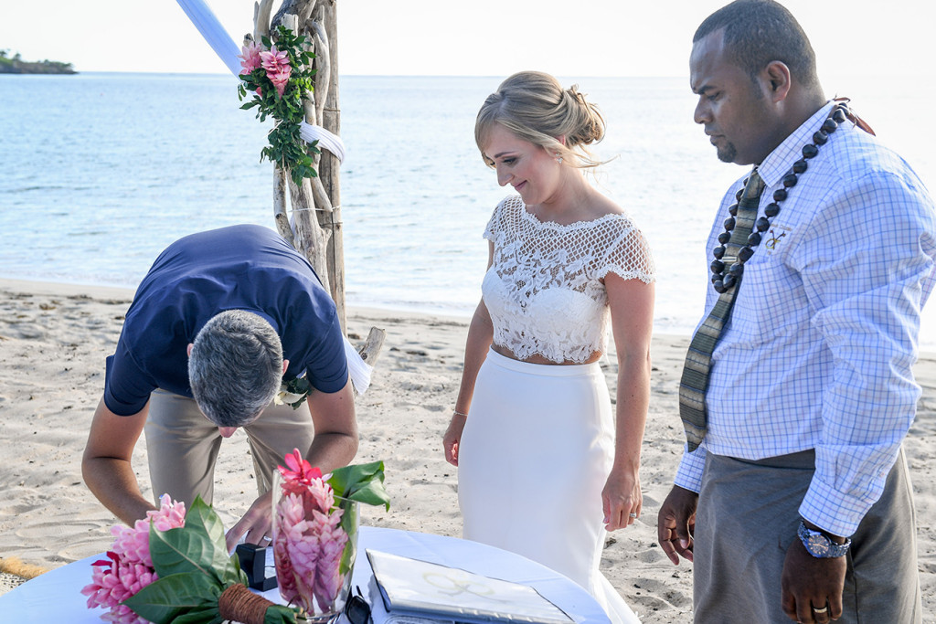 Signing of marriage certificate in Yatule Fiji elopement beach wedding