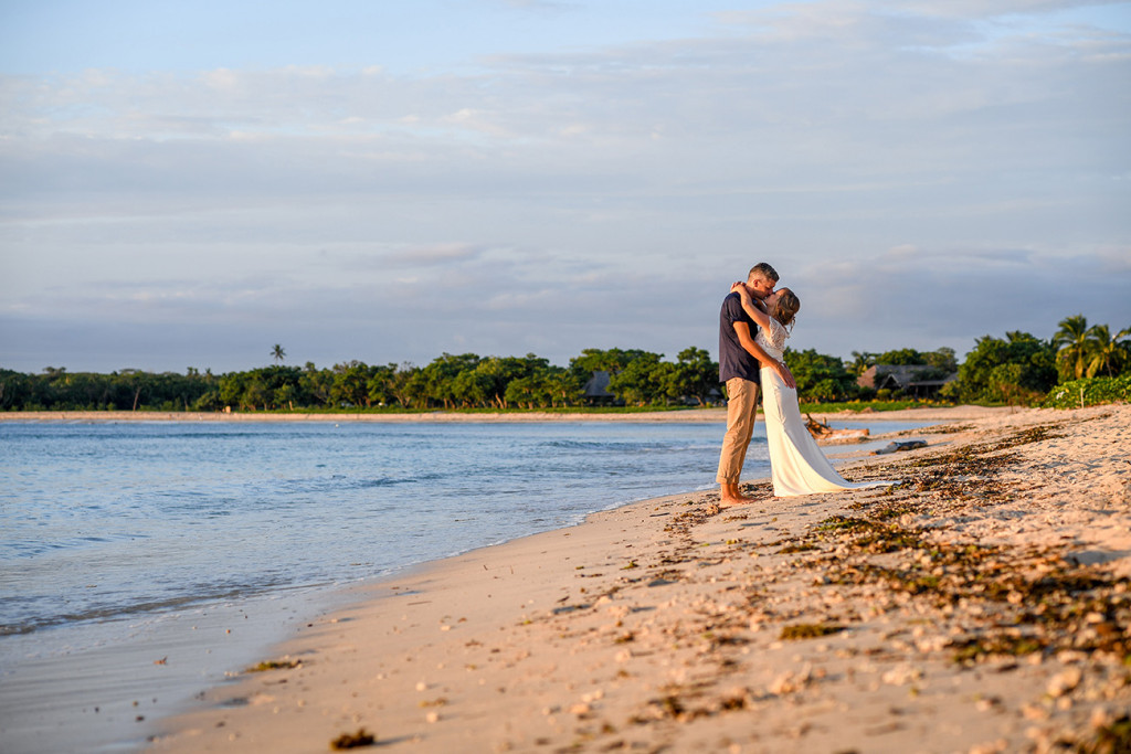 Eloped couple kiss on Coral Coast Fiji