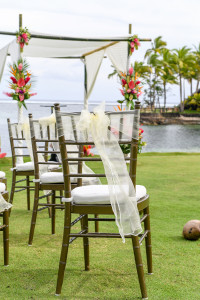 Lace draped over simple chair in stunning Fiji wedding