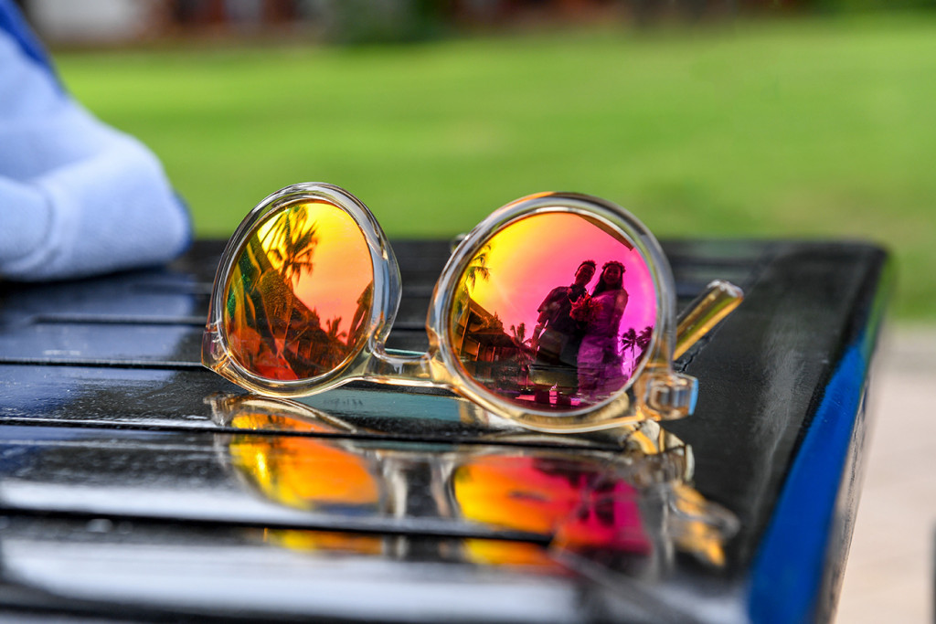 Reflect photography - Polarized sunglasses reflecting bride and groom