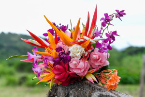 Closeup of pink and orange floral bouquet captured by Anais Chaine