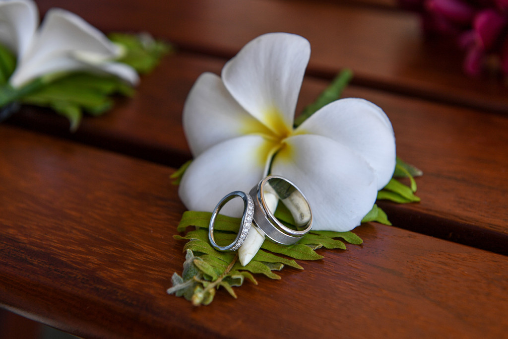 Closeup of silver rings on tropical white Fiji flower