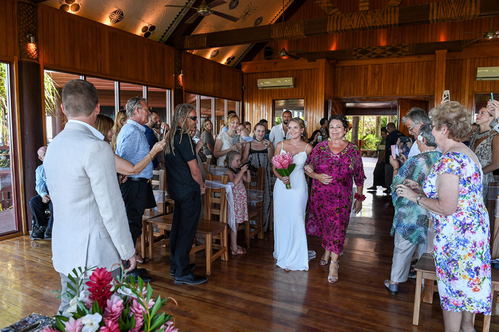 Mom walks bride down the aisle in Outrigger Fiji wedding