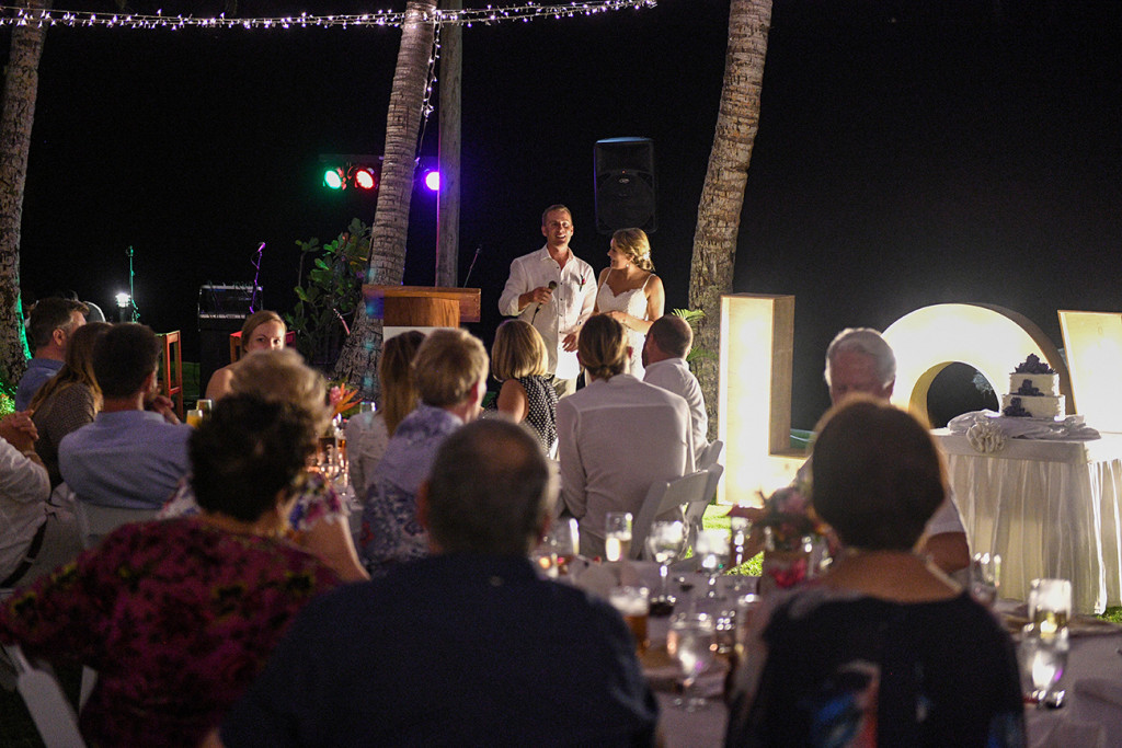 Bride and groom give speech at the Outrigger beach resort