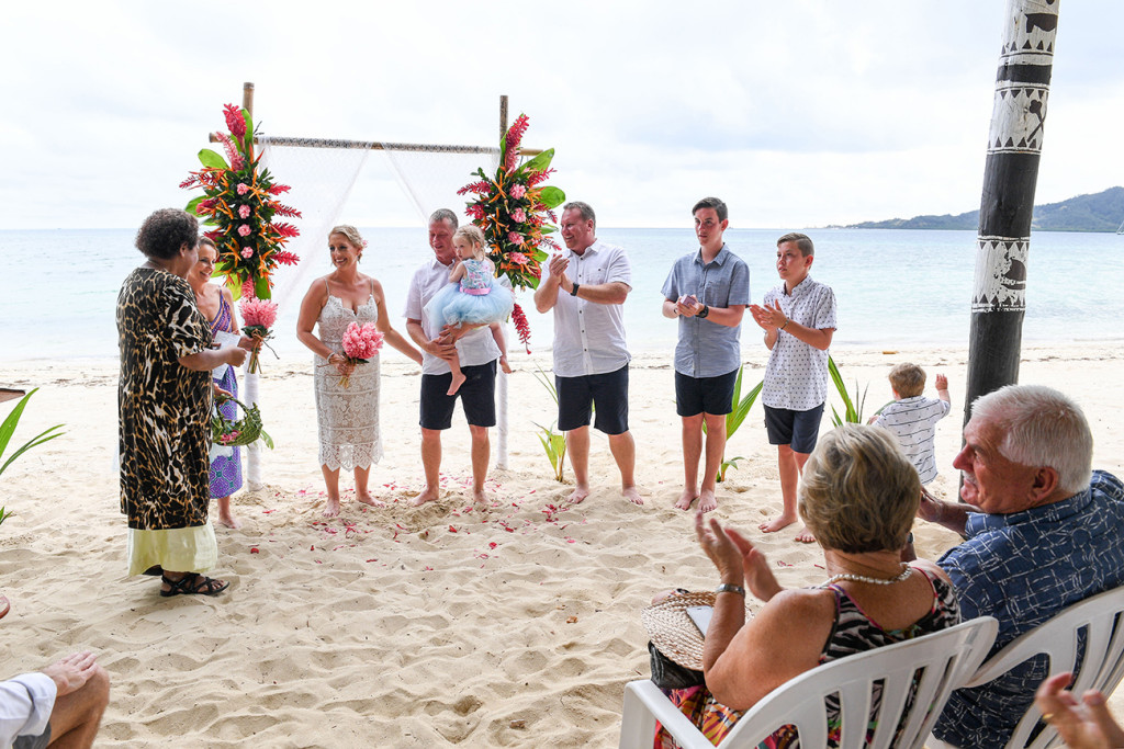 Family at the aisle of Fiji Plantation Island Resort family wedding