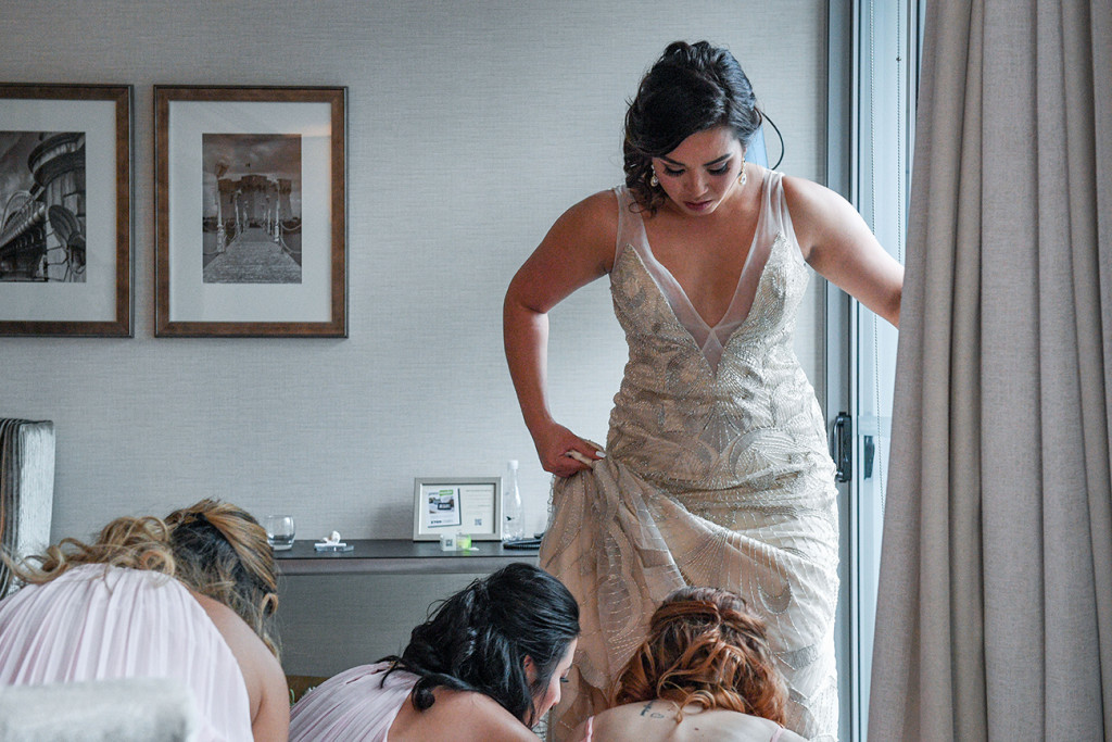 Bride steps into her wedding shoes