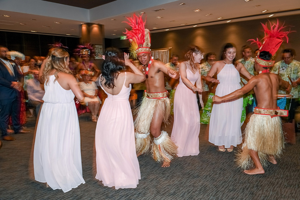 Bridal party join Traditional Polynesian dance performed at the wedding in Sofitel Auckland