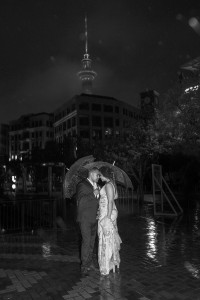 Monochrome photo of the bride and groom in the night at the Auckland Viaduct