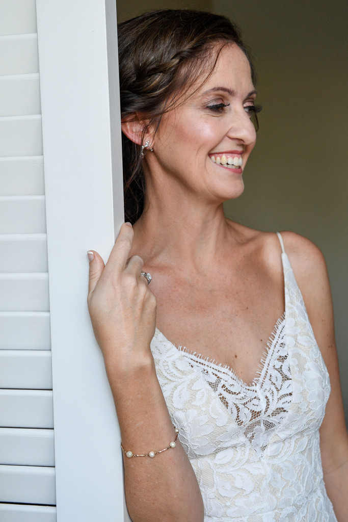 Stunning bride smiles at the door in Sofitel Wedding Fiji